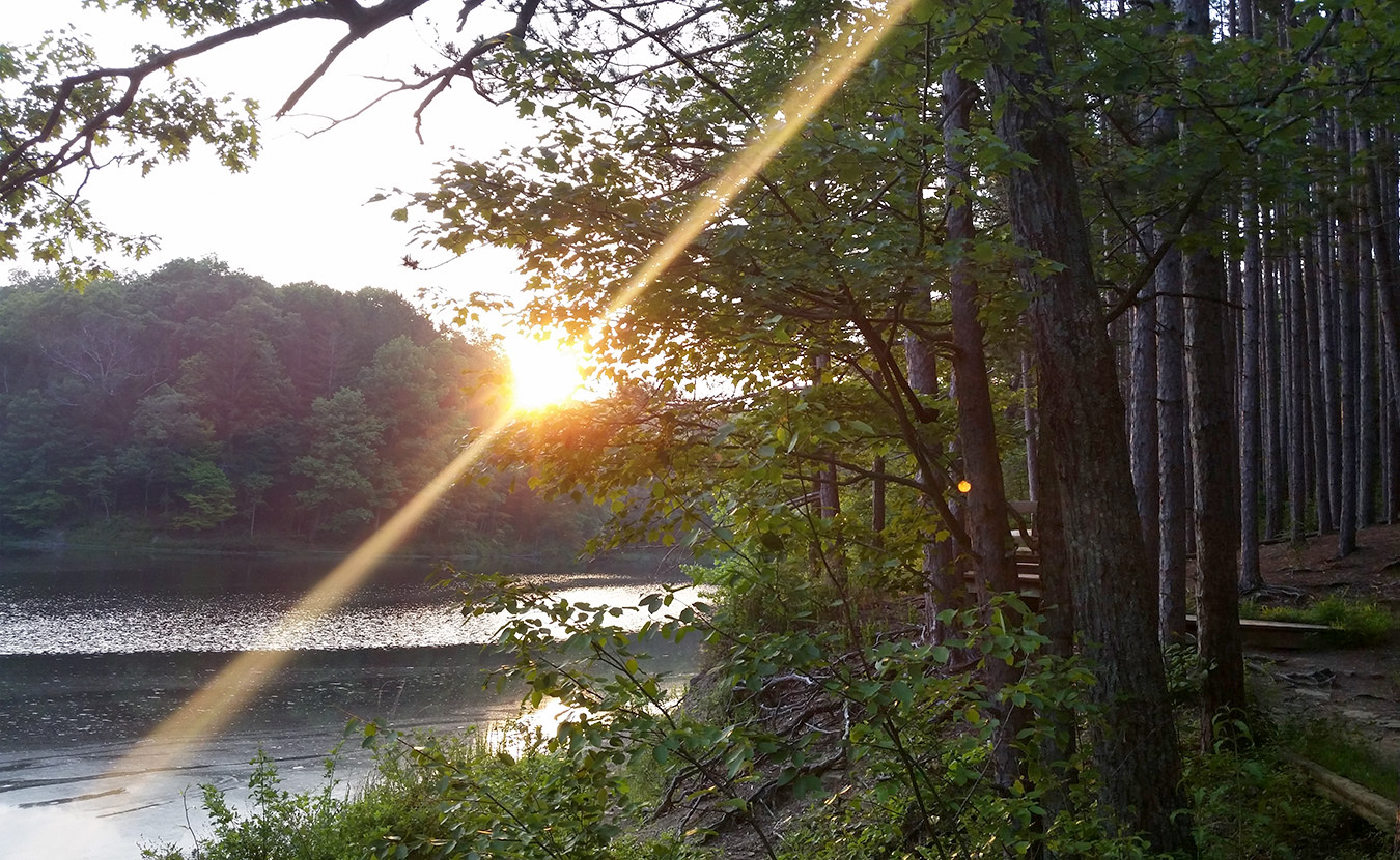 The Strahl Lake Trail wraps around a beautiful lake in Brown County State Park. | Photo by Miranda Addonizio