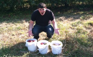 Ruthie's son, David Cohen, shows off their apple-picking haul. | Courtesy photo