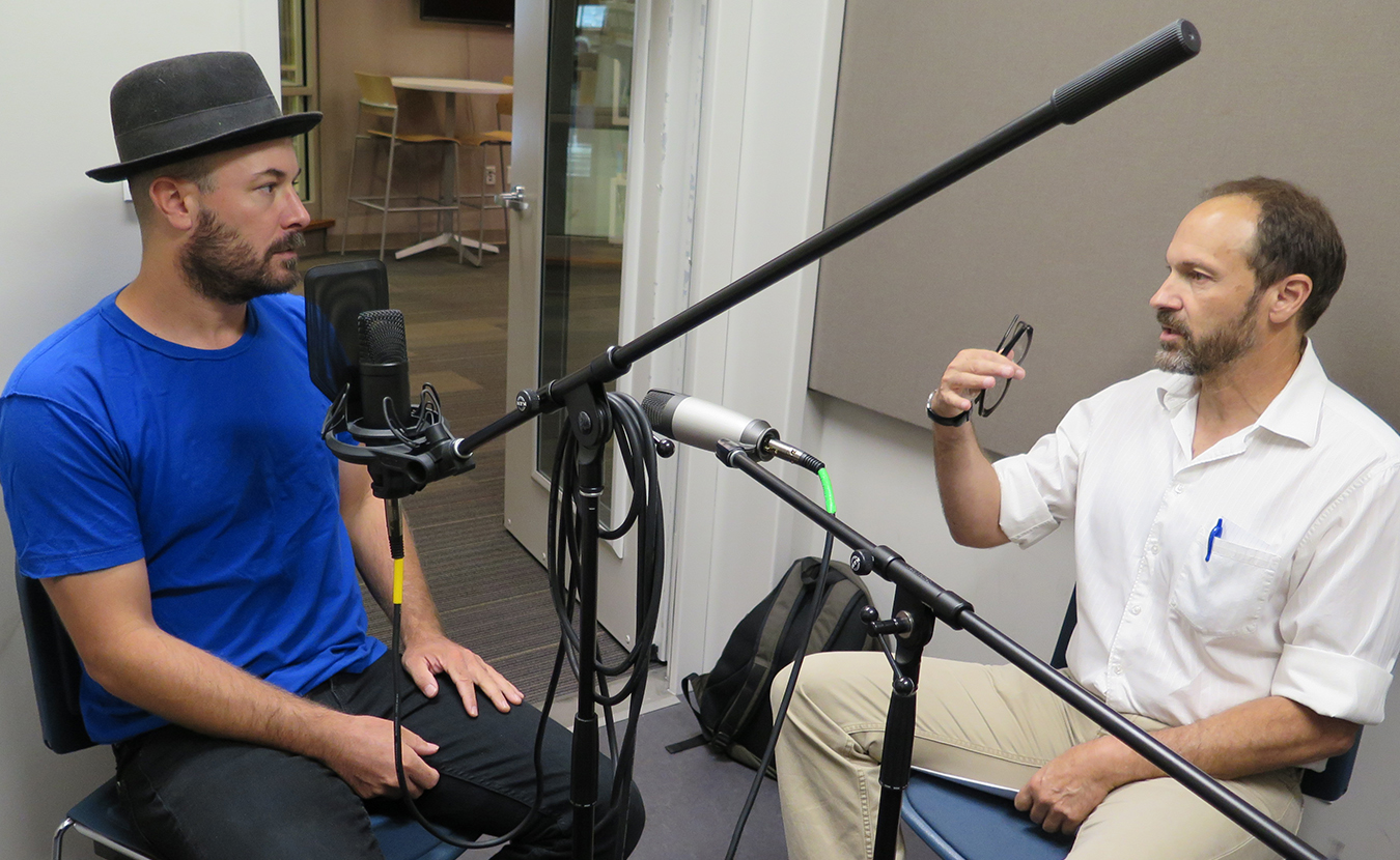 Chris Mattingly, left, tells Dave Torneo about his journey to the poet’s life at the Monroe County Public Library's Level Up studio. | Limestone Post