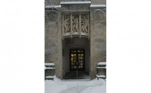 I’ve always loved the relief above the door at the former Indiana University School of Medicine building (now Myers Hall), and it looked so elegant framed in snow and with the warm light inside. | Photo by Ann Georgescu