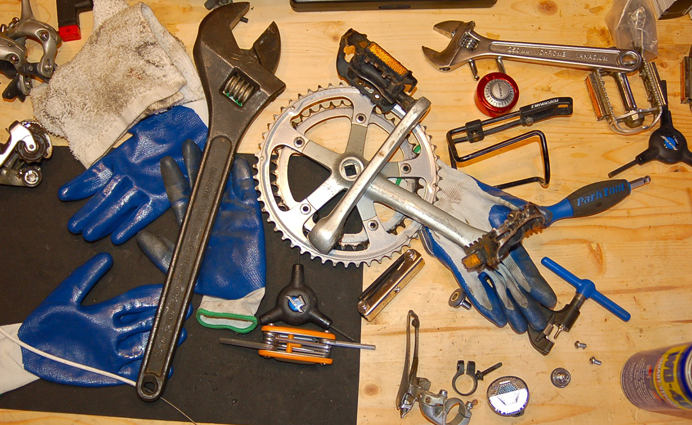 Wright’s work bench in the middle of breaking down Welsch's bike. | Photo by Sam Sveen