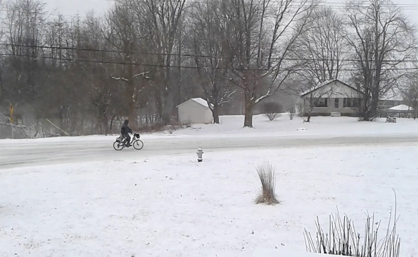 Many Monroe County residents commute to work by bike, no matter the weather. On this day in 2014, a bike commuter heads into town from the south side of Bloomington in negative-degree weather. | Limestone Post