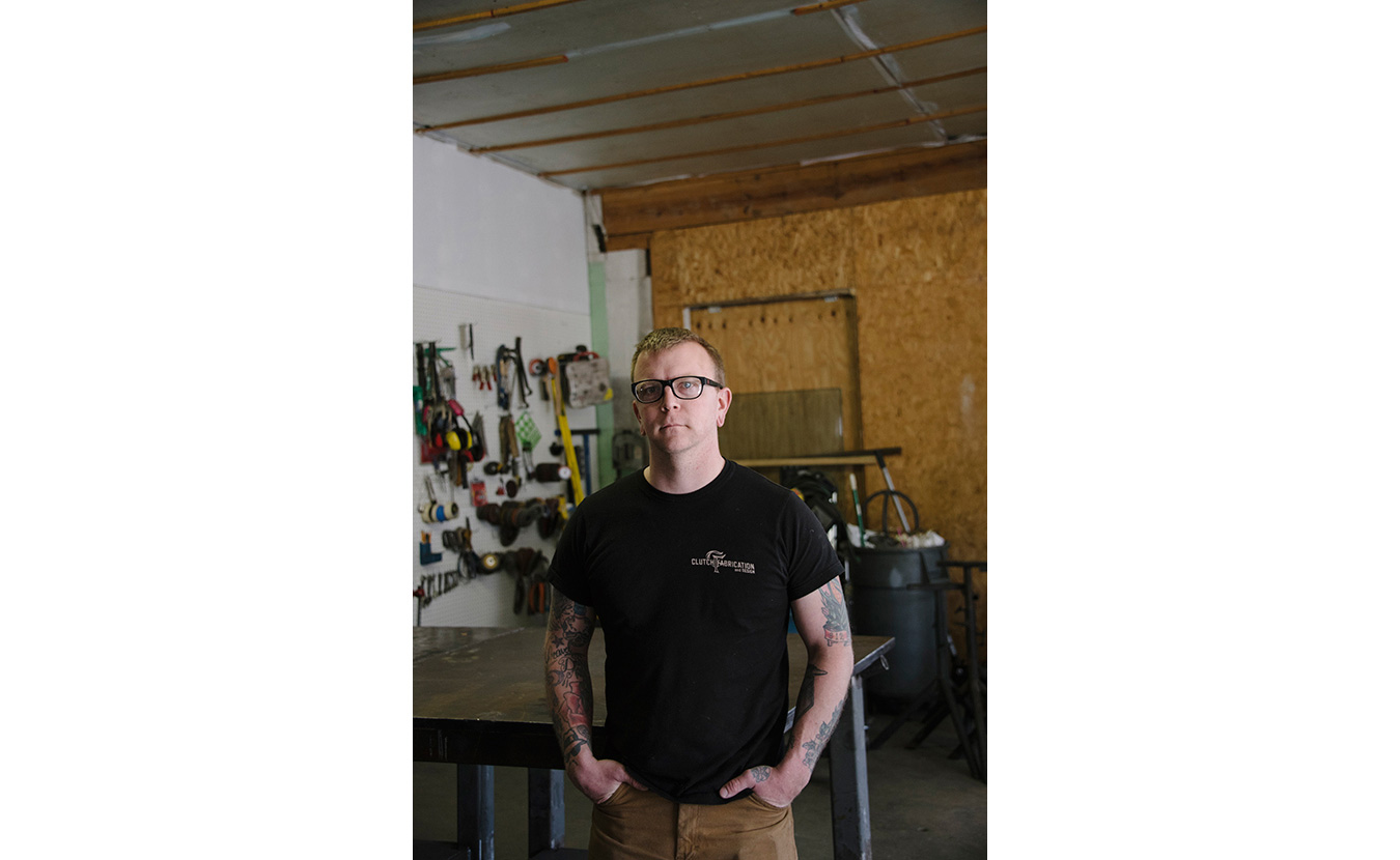 Josh Smith, owner of Clutch Fabrication & Design Studio, in his space at Artisan Alley. | Photo by Natasha Komoda