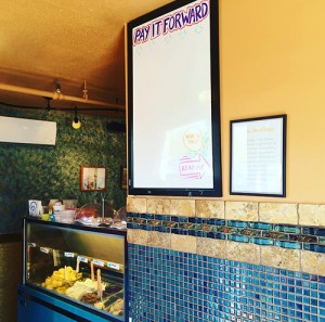 Falafels Middle Eastern Grill's new voucher board can be found near the cashier. | Photo by Lynae Sowinski