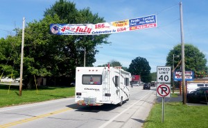 The 4th of July is celebrated "like Christmas," and excitement starts to build when the sign goes up over Highway 60 a few weeks in advance. | Photo by Michael Waterford