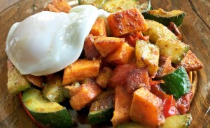 The often-ignored zucchini gets center stage in Ruthie Cohen's Zucchini and Sweet Potato Hash with Eggs recipe. | Photo by Ruthie Cohen