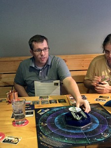 Mike Trotzke plays a game at Cardinal Spirits' Board Game Night in July. | Limestone Post