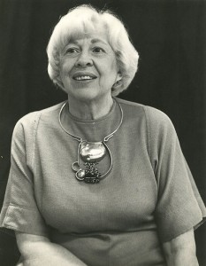Eikerman, wearing one of her pieces made out of silver, green onyx, and gold. | Photo courtesy of Indiana University Archives