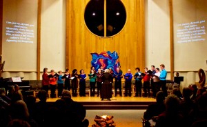 Voces Novae, pictured here giving a concert in February at Unitarian Universalist Church, is celebrating their 20th anniversary with a concert called “The Art and Science of Happiness” on Saturday, May 13. | Photo by Merrill Hatlen