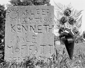 This photo, taken by Wolin in 1984, shows a handcarved grave marker inscribed with “Asleep in Jesus,” with a backwards “J.” | Photo by Jeffrey Wolin