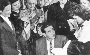 Writer Ross Lockridge Jr. (RLJ) killed himself on March 6, 1948, just two months after his book "Raintree County" was published. Pictured here, RLJ is signing autographs at an L. S. Ayres department store in Indianapolis on January 20, 1948. This is the last known photograph of RLJ. | Photo by Robert Lavelle, "The Indianapolis News." Photographs from raintreecounty.com are used with permission of The Estate of Ross Lockridge, Jr.