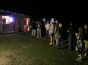 Patrons wait to enter the Barn of Terror. | Limestone Post