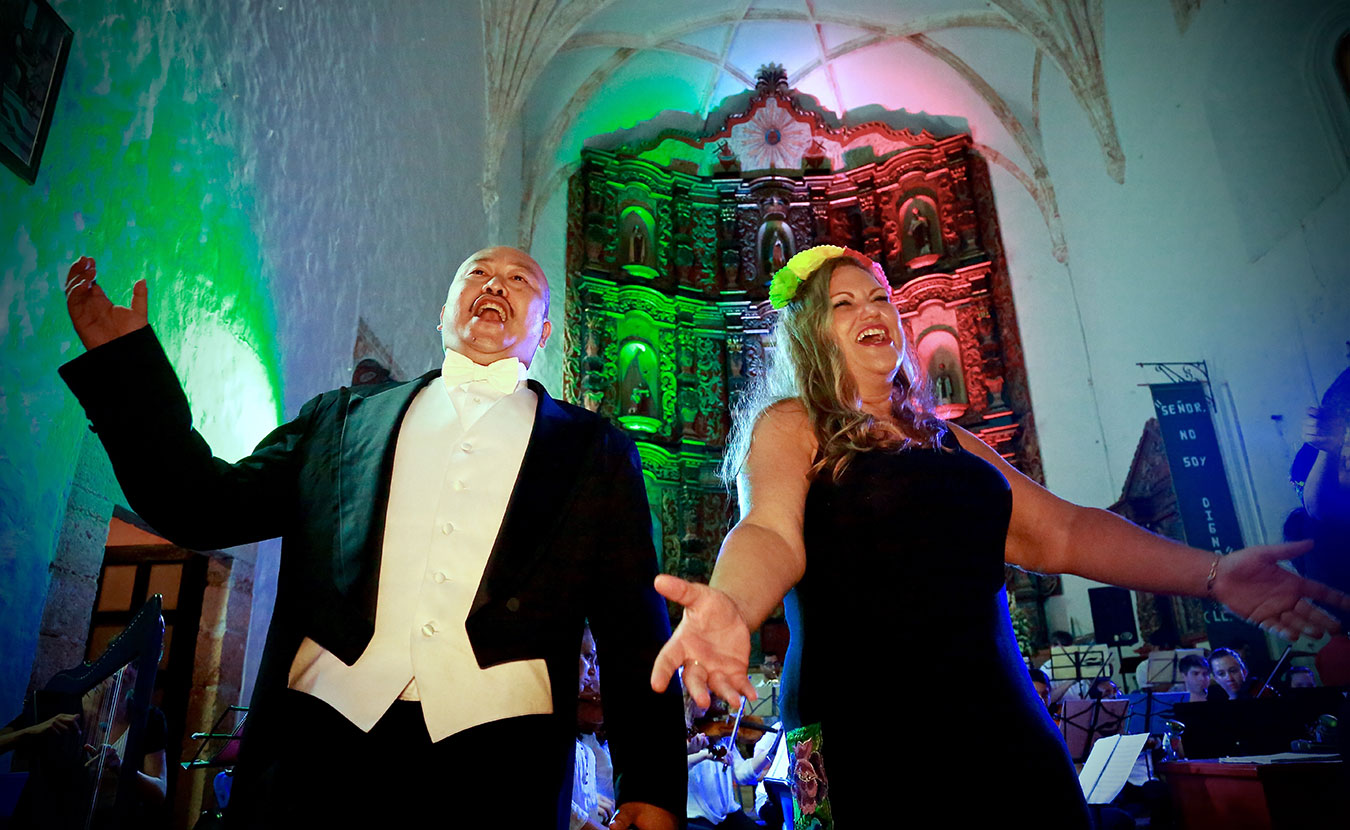 Tenor Simon Kyung Lee and soprano and founder of ÒperaMaya Mary Grogan sing a duet during the ÒperaMaya summer music festival. | Courtesy photo