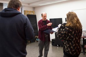Director Liam Castellan (center) works with Steven Hunt (Senator Whitmore) and Tess Cunningham (Alex Klein) during rehearsal for "Church & State." | Photo by Chaz Mottinger