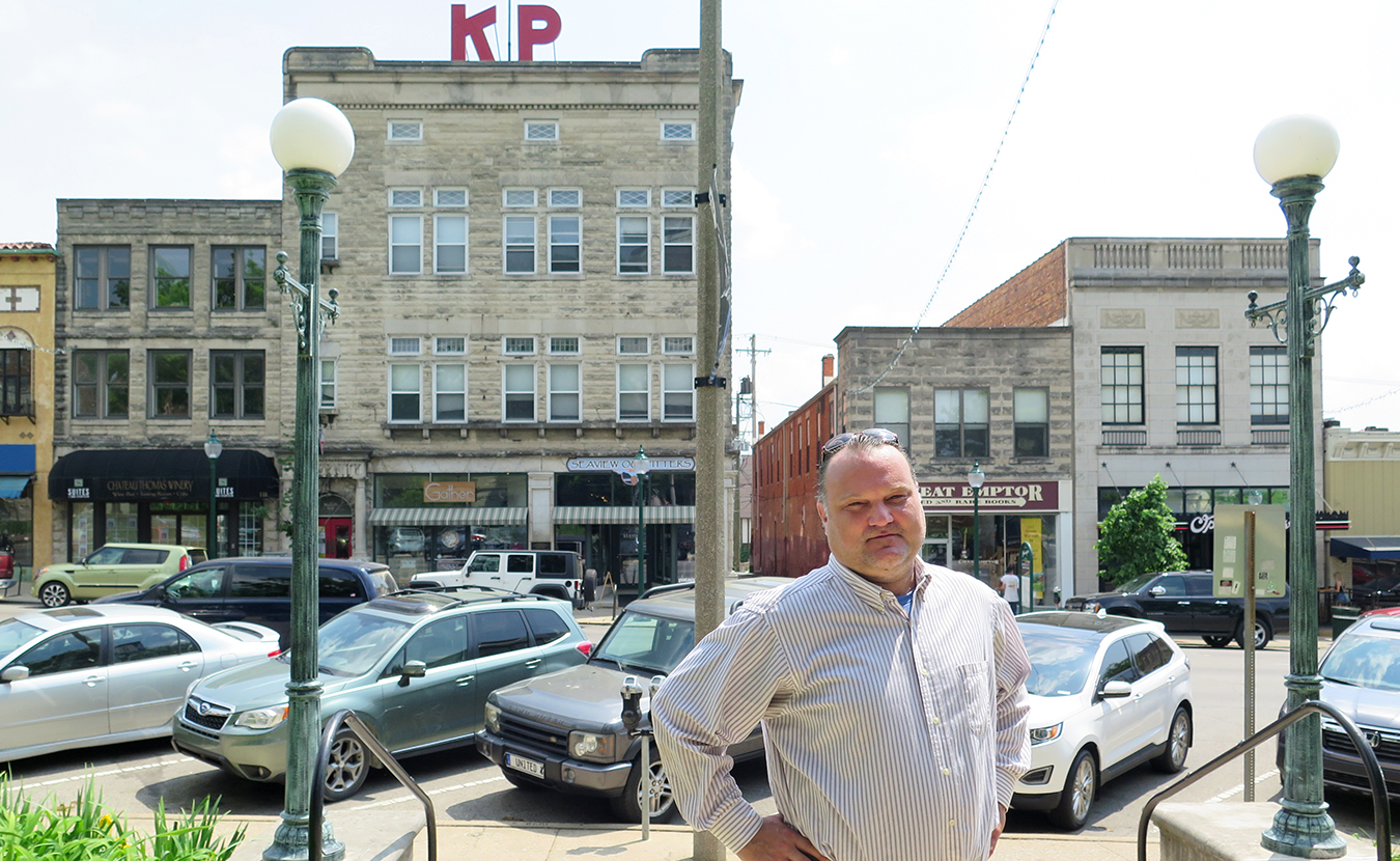 A family project of photographing Bloomington’s history became a mission for Derek Richey (pictured here on the east side of the downtown Square) to preserve its past. Now he works with a fervor to preserve the houses that give our community so much character. | Limestone Post
