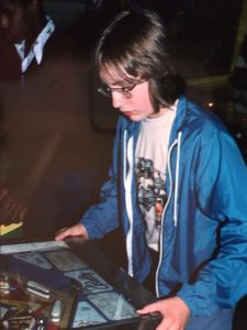 Johnson, playing pinball as a child in the late 1970s. | Courtesy photo