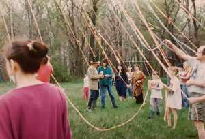 Members of May Creek Farm celebrate May Day with a maypole. | Courtesy photo