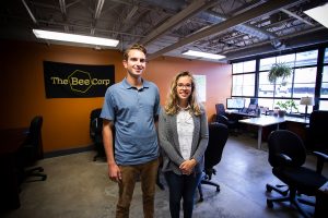 Wyatt Wells, left, and Ellie Symes of The Bee Corp say that the community and employees value B corps and their commitment to "doing good." | Photo by Chaz Mottinger