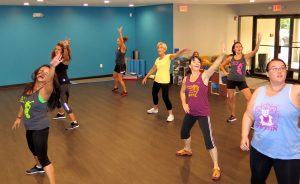 Writer Jennifer Pacenza, pictured far right at a Bollywood dance class, spoke with experts who say a body-positive fitness model is more important for achieving physical and mental well-being than exercise regimens promoted by fitness and weight-loss industries. Pacenza says it's important to find a way that you love to move your body. | Limestone Post