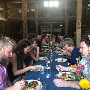 Many local small farms focus on creating community, such as CSA potluck nights at Sobremesa Farm, pictured here. | Courtesy photo