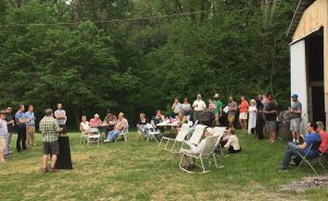 Several dozen people are interested in living at the Cohousing Project property. These future community members get together for events at their future home, such as this community picnic. | Courtesy photo