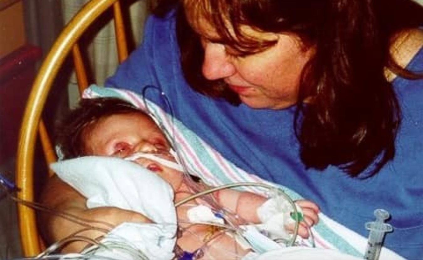 “Helplessly watching your child experience pain changes you at a basic level,” says writer Troy Maynard. When his daughter was just three weeks old, her heart stopped and she had to undergo heart surgery. | Courtesy photo