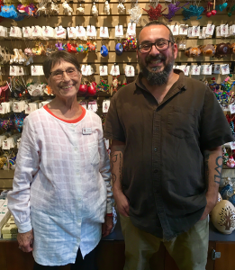 Staff member Gracia Valliant (left) and store manager Dave Debikey have both traveled to meet with artisans and have seen fair trade break the cycle of poverty firsthand.“Fair trade supports efforts toward equity, environmental sustainability, and protecting human rights,” says Debikey. In her experience with women makers in Guatemala, Valliant says that, not only does fair trade provide financial independence, but it also helps reduce sex trafficking and child labor.