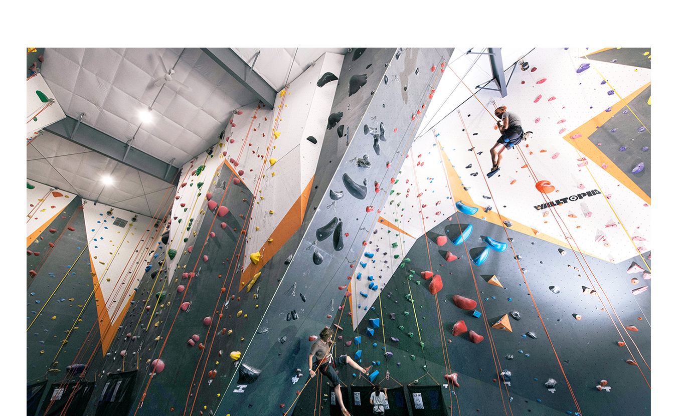 Hoosier Heights offers a variety of climbing experiences and welcomes climbers of all ages and expertise. The new gym has bouldering, a classic belay as well as an auto-belay system, and a ropes room. In addition, the new location in McDoel Gardens has a community room, yoga classes, and exercise equipment.