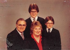 Troy (top, center) with his step-dad, Russell Kearby, mom, Janice Petty (then Kearby), and brother, Martin Maynard. | Courtesy photo