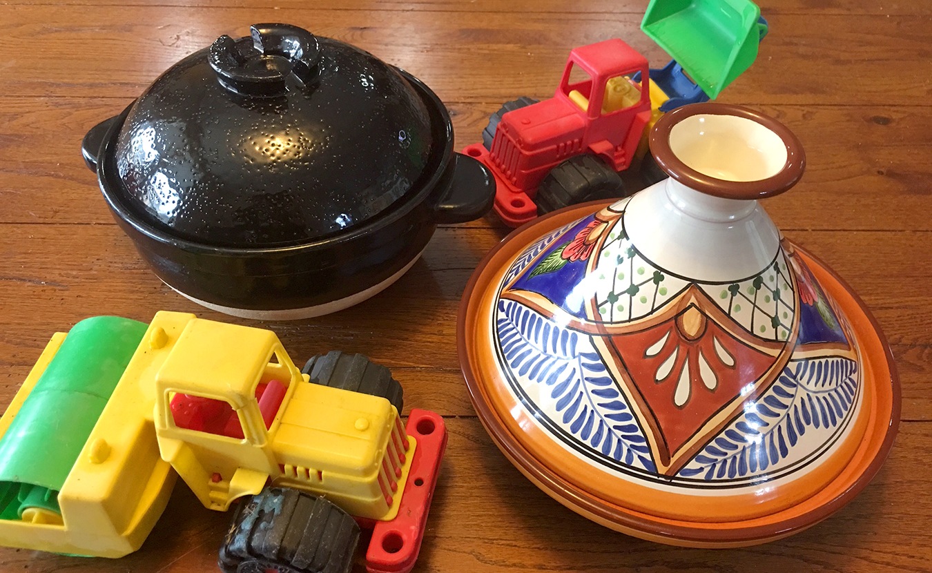 Her grandson’s fascination with dump trucks has helped Ruthie Cohen to up her game in the kitchen. Now she considers “other methods and materials for cooking.” Led by “a little child with his toy bulldozer in hand,” she explores how a Japanese donabe, left, and a Tunisian tagine, right, can enrich your kitchen creations. | Photo by Ruthie Cohen