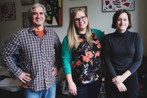 The LP team last year during final proofing of our first print edition, ‘A Sense of Place.’ (l-r) Cofounder and Publisher Ron Eid, Cofounder and Editorial Director Lynae Sowinski, and Marketing & Advertising Director Emily Winters | Photo by Chaz Mottinger