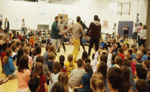Members of the music group Adilei performed in the gymnasium of Childs Elementary in April as part of the Lotus Education & Arts Foundation’s Lotus Blossoms educational outreach program. Childs fifth-grader Stella H., 11, called the performance "an eye opener.” | Courtesy photo