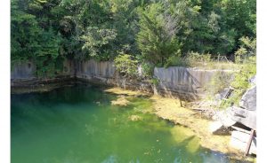 No swimming will be allowed in any of the quarries on the property due to potential PCB contamination. An adjacent property was declared an EPA Superfund site. While “most” cleanup activities finished in 1999, long-term monitoring continues. | Photo by Geoff McKim