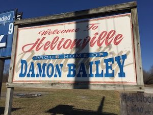 Billboard proclaiming that Heltonville is the proud home of Indiana high school basketball legend Damon Bailey. | Limestone Post