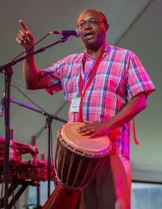 Masankho Banda, a performance artist, storyteller, and drummer from Malawi, was among the artists scheduled to meet with school children in Indiana this year for the Lotus Blossoms program. | Photo courtesy of Masankho Banda