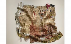 Another recent acquisition by the Eskenazi Museum of Art, Untitled, by El Anatsui, who has since spent much of his artistic career in Nigeria. Aluminum bottle caps and copper wire (2009). | Photo by Paige Strobel