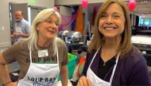 Soup Bowl volunteer Licia Weber (left) and Newcomer. Weber remembers “making a lot of soup” for the first Soup Bowl in 1994. | Photo by Duane Busick