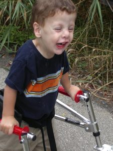 At age two and a half, Samuel was eager to explore the world beyond his home, with the independence offered by his walker and the safety provided by sidewalks. | Courtesy photo