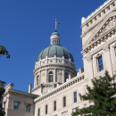 By means of partisan gerrymandering, the Indiana legislature has violated the democratic principle of one person, one vote, says retired Indiana University Professor Emeritus Jim Allison. Proportional representation, he says, would help to give Hoosiers “free and fair” elections, as required by the state constitution. | Photo of the Indiana Statehouse via Wikimedia Commons, CC BY-SA 3.0; the original uploader was Jasont82 at English Wikipedia.
