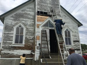 “You could stand inside and see the sunlight through the wood siding,” Mitchell says of the First Baptist (Colored) Church before its renovation. | Photo by Elizabeth Mitchell