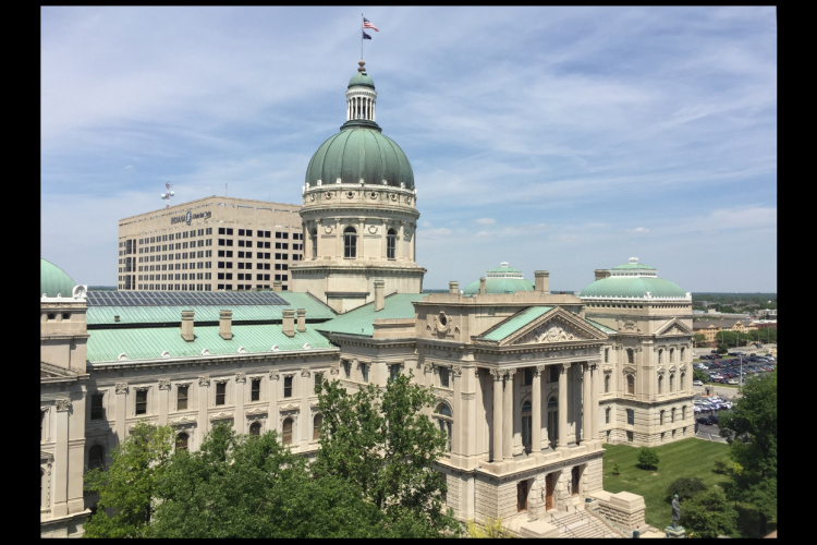 Members of the Indiana House of Representatives and Indiana Senate meet during legislative sessions to pass laws at the Indiana Statehouse (above). Many of those lawmakers have economic interests in the industries that stand to benefit from the laws those lawmakers author and vote on. | Limestone Post