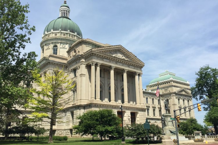 During legislative sessions at the Indiana Statehouse (above), any member of the Indiana House of Representatives or Indiana Senate can sponsor a bill. While a bill in either chamber must pass through a series of gatekeepers before becoming law, conflicts of interest among the lawmakers are usually not considered. | Limestone Post
