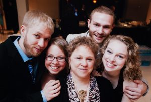 “Growing up, our house was full of music,” says Julia Reardin, Janiece’s oldest daughter. Janiece with her children (l-r): Chip Reardin, Julia Reardin, Janiece Jaffe, Jurion Jaffe, and Celina Jaffe in 2011. | Photo courtesy of the Jaffe/Reardin Family