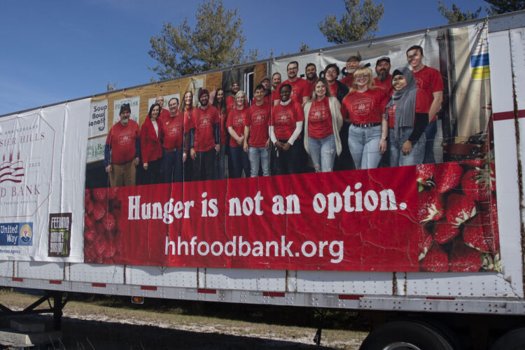 Parents working multiple jobs, college students struggling financially, elderly veterans with serious health conditions, people living in rural areas with limited food options. … These are just some of the folks who experience food insecurity. The people working to fight hunger in Monroe County say they can’t keep up with the demand. Above, a storage trailer outside of Hoosier Hills Food Bank. | Photo by Olivia Bianco