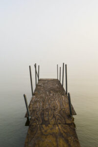 Lake Lemon — I went to the lake looking for the perfect scary fog picture. There was so much that brought that feeling like seeing the cover of a mystery novel. Once I got out of my car and turned around, the dock stood out the most. I didn’t see the depth of the faces until later.