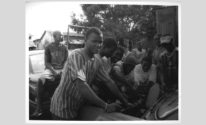 Le Mécanicien Automobile (The Mechanics). Conakry, Guinea, 2009, Gelatin Silver Print. “Young men learn the art of being a mechanic in a small trade school.” | Photo by Megan Snook