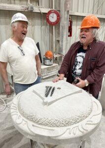 Cunningham (left) and Sturdevant share a laugh at the Bybee stone mill. | Limestone Post