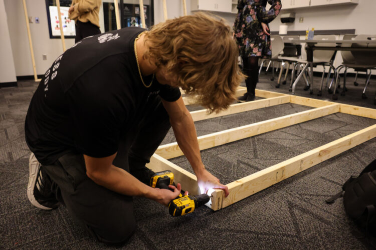 A student works in the Design Studio in the Innovative Learning Center at Edgewood High School in Ellettsville. Edgewood has dozens of students doing in-house internships and apprenticeships, some paid and some unpaid, or working at student-run businesses. | Photography by Benedict Jones