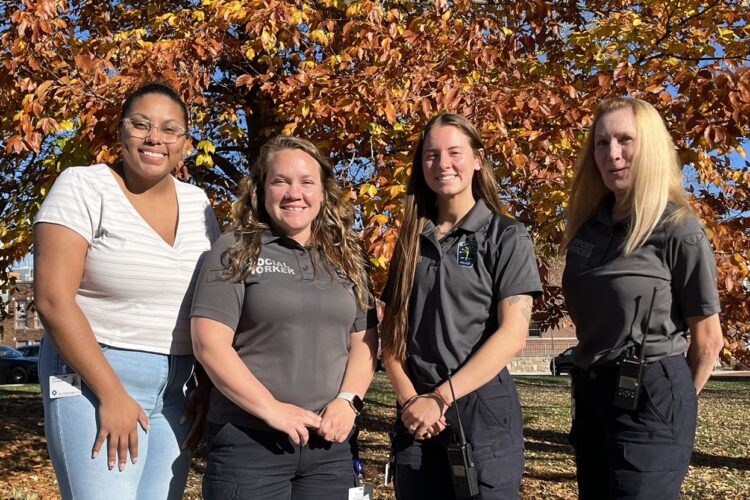 The licensed mental health professionals on the Social Support Services Team at the Bloomington Police Department say they offer types of help that uniformed police officers aren’t trained to provide. (l-r) Dayona Cunningham, BPD Social Work Intern; Melissa Stone, MSW, LCSW; Mallory Swanson, MSW, LCSW; Pamela Flick, MA, LMHCA. | Limestone Post