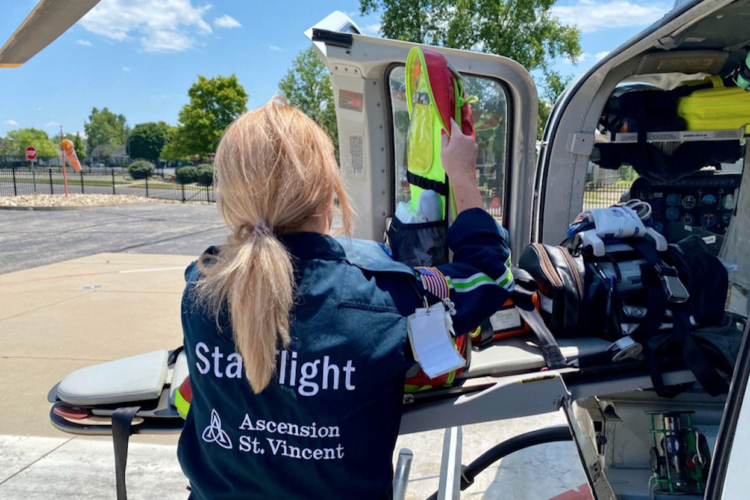 People take varied paths to the emergency medical profession, and their journeys can differ by geography. Nonetheless, Christine Brackenhoff writes, EMS personnel and agencies across our region have a strong spirit of interconnectivity. Above, flight paramedic Ashley Lucas prepares equipment for the next flight. | Photo by Christine Brackenhoff